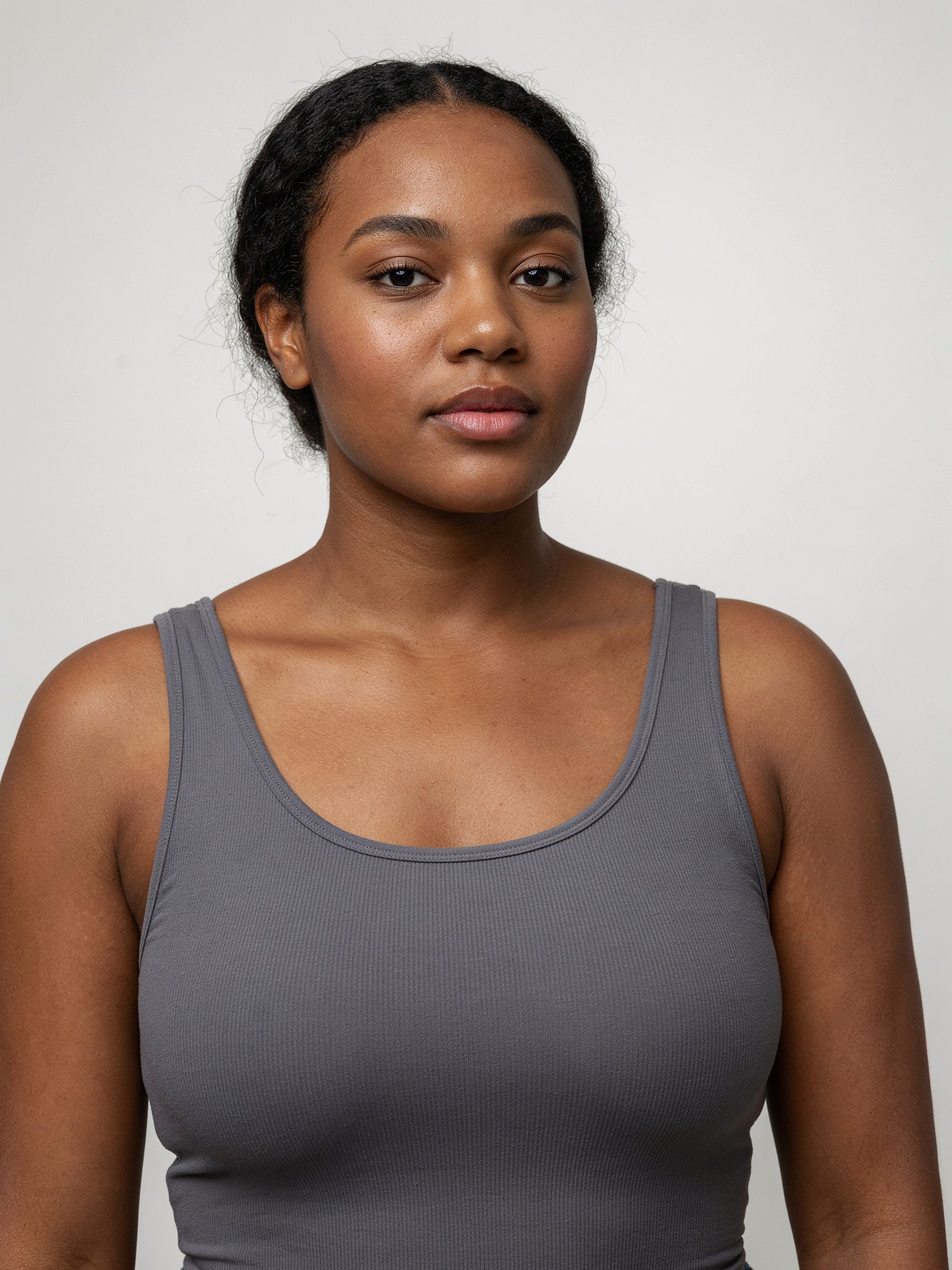Head-and-shoulders catalog view of the plus-size model