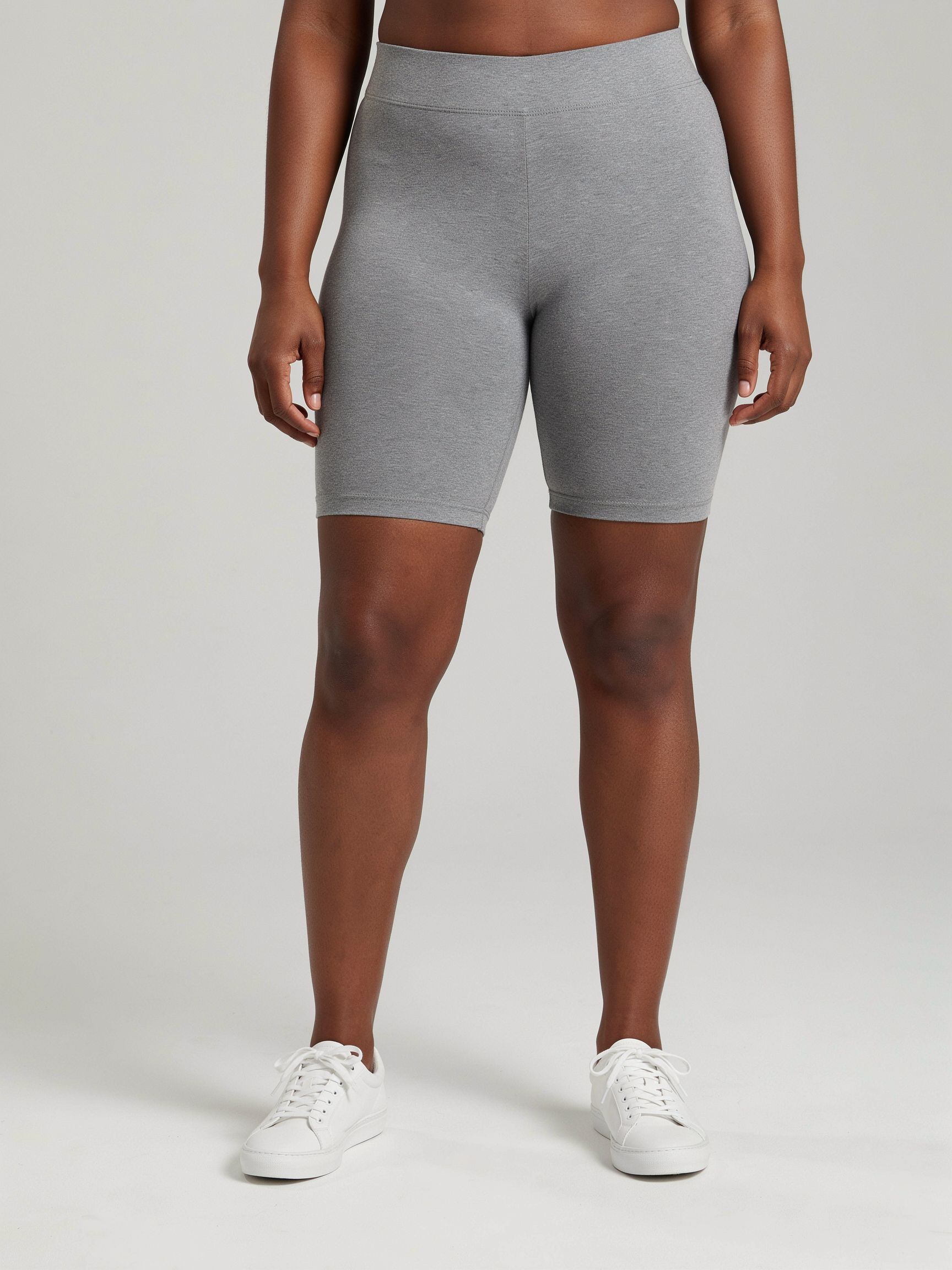 Lower-body catalog view of the plus-size model
