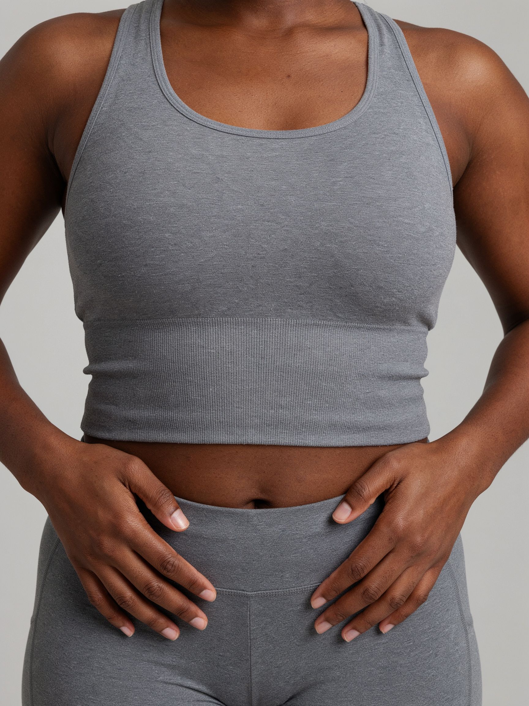 Hands and midsection catalog view of the plus-size model