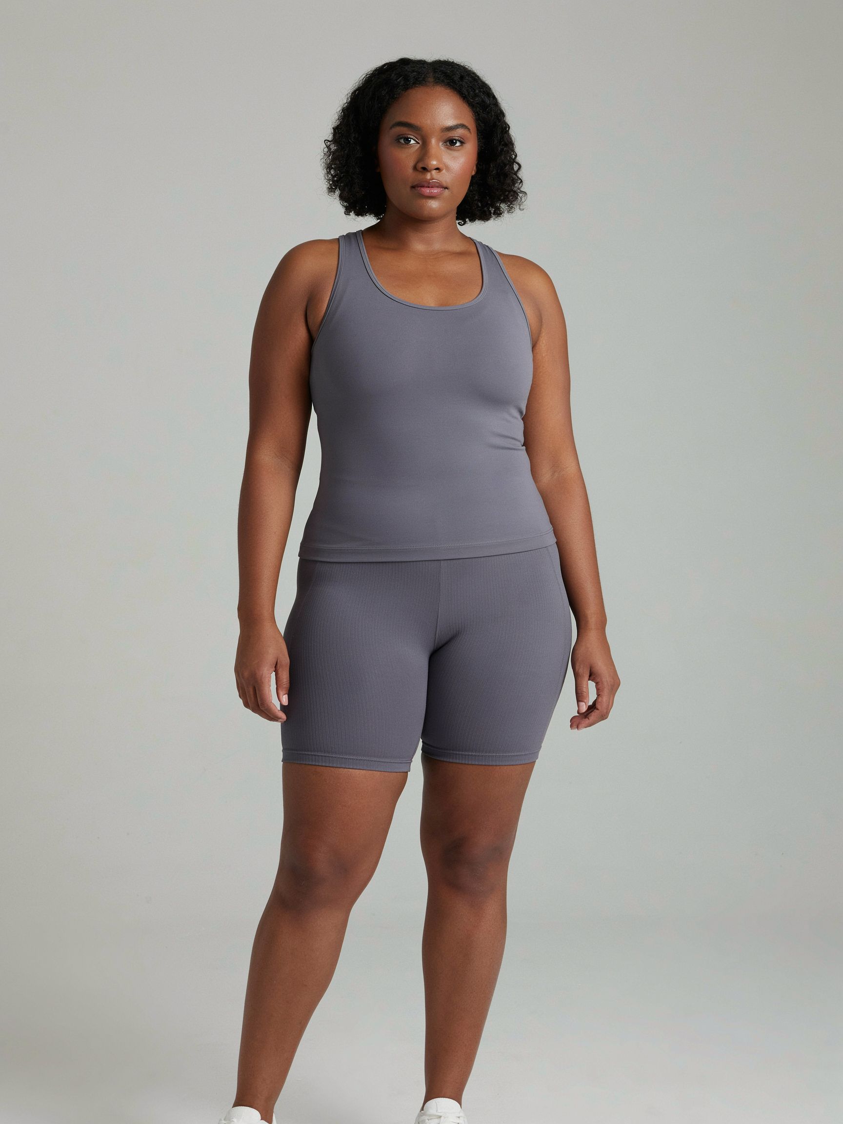 Three-quarter catalog view of the plus-size model