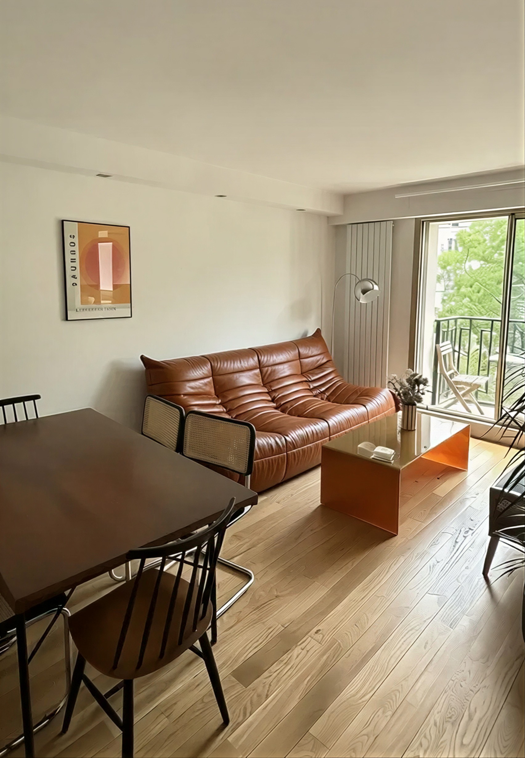 Room restaged with the reference sofa